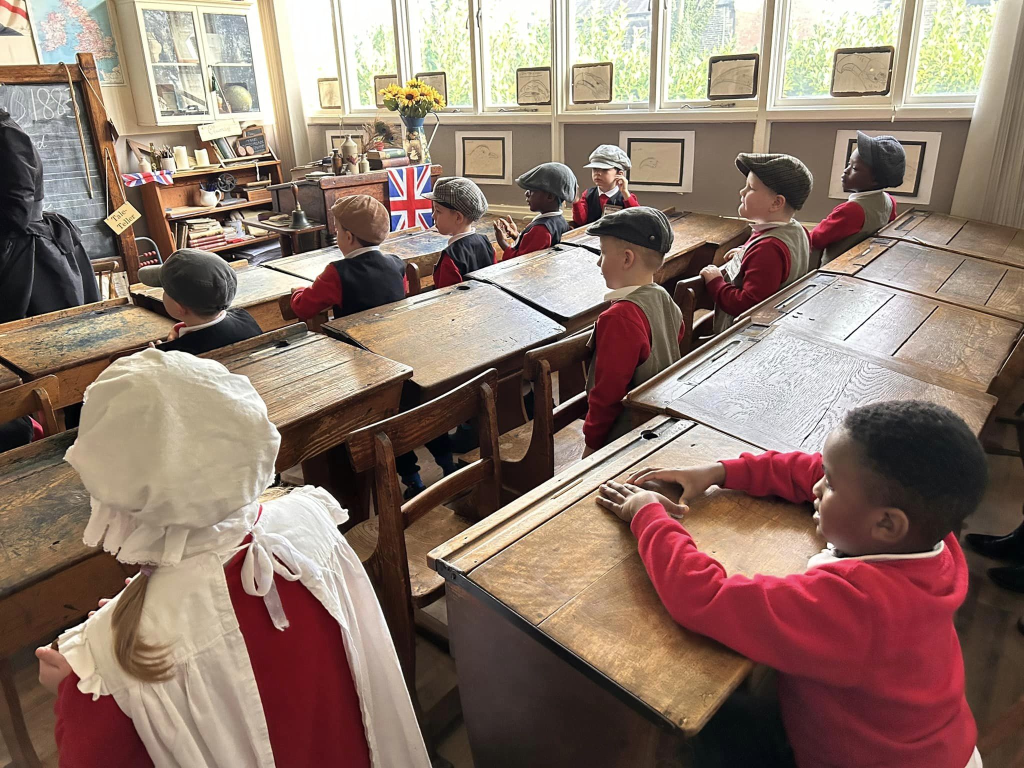 Year 1 experiencing what it was like to be a Victorian child at school.